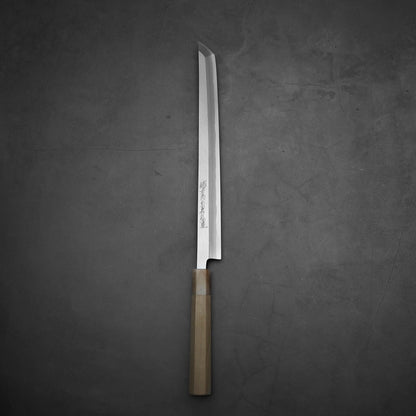 Top down view of Yoshikazu Tanaka 300mm sakimaru takohiki knife with a hand-forged blade made of shirogami#2 steel.