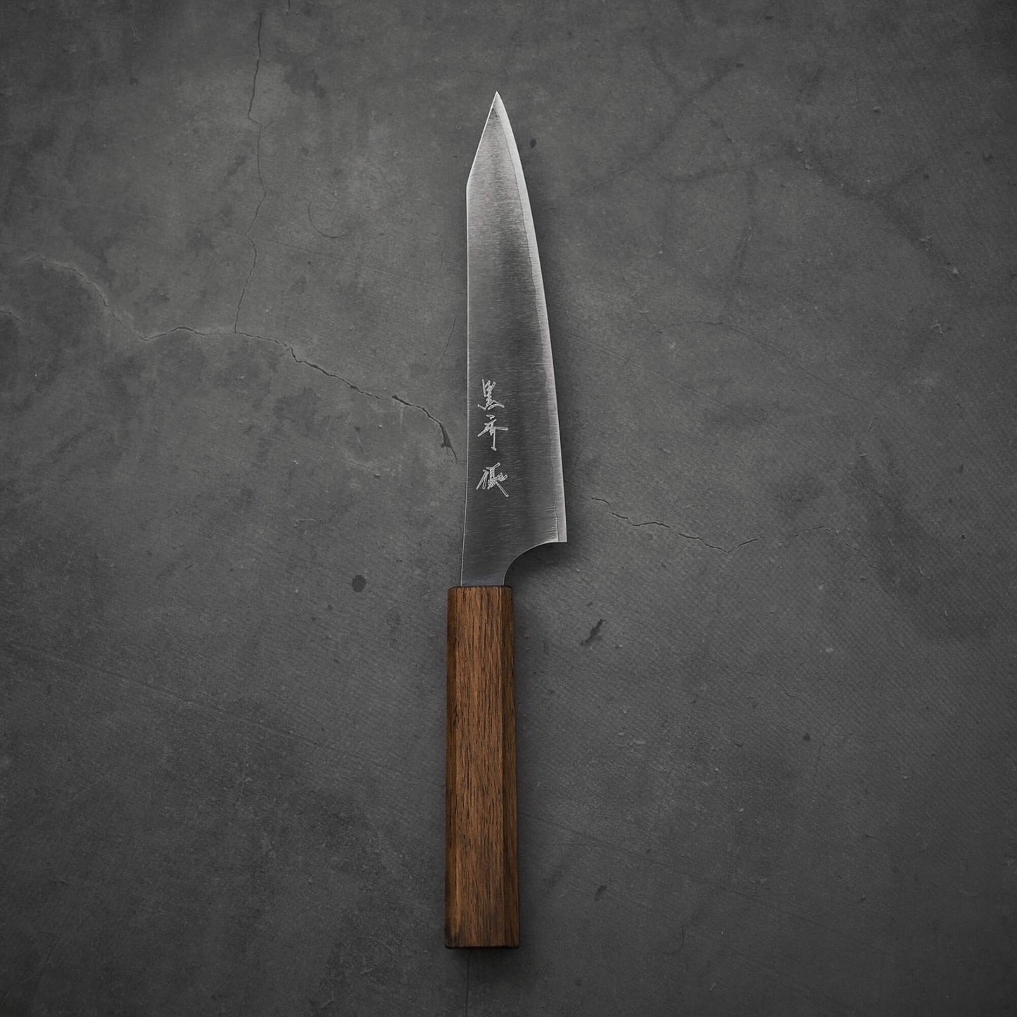 Top view of a Yu Kurosaki HAP40 Gekko petty knife in vertical position.