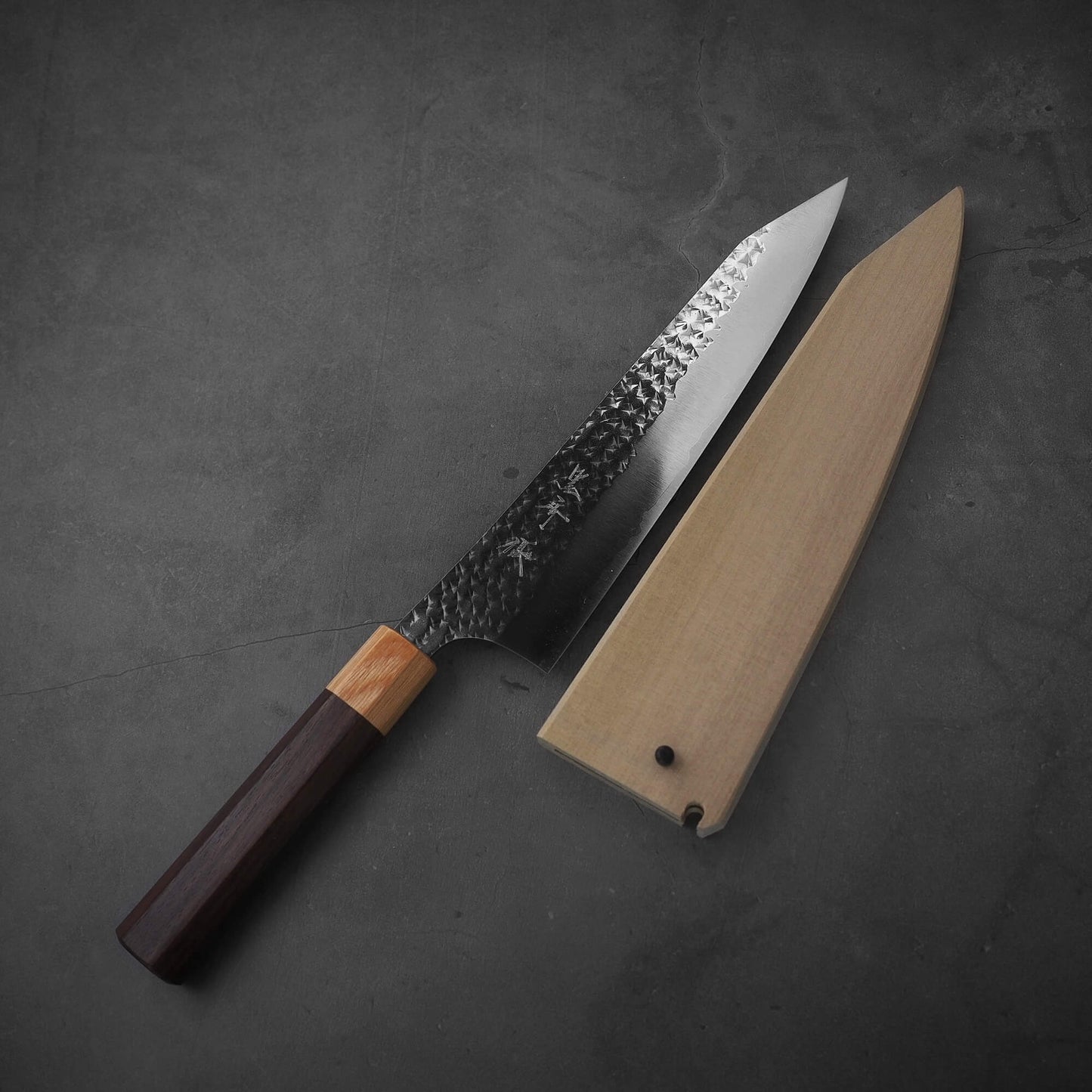 Top view of Yu Kurosaki SG2 Senko kiritsuke gyuto 210mm with magnolia saya