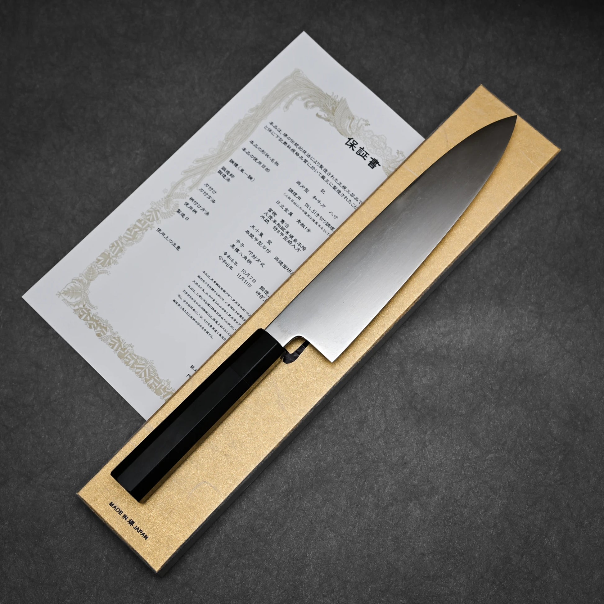 240mm Kenji Togashi honyaki aogami#1 gyuto knife showing full blade profile with box and certificate