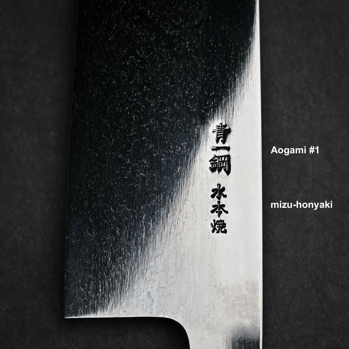 240mm Kenji Togashi honyaki aogami#1 gyuto knife showing close up view of kanji stamps