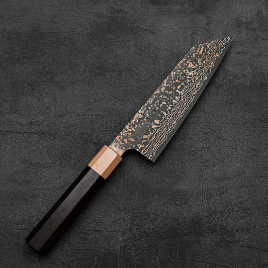 Top down view of Takeshi Saji VG10 Gold damascus bunka knife