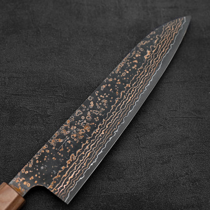Close up view of the blade of Takeshi Saji VG10 Gold damascus gyuto knife