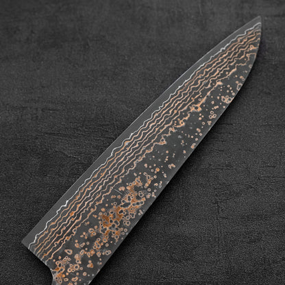 Back side of the blade of Takeshi Saji VG10 Gold damascus gyuto knife