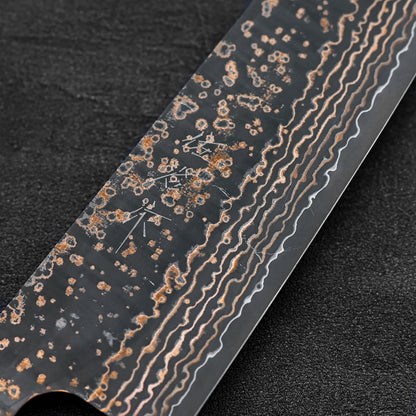 Close up of the kanji of Takeshi Saji VG10 Gold damascus gyuto knife