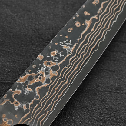 Close up of the kanji of Takeshi Saji VG10 Gold damascus petty knife