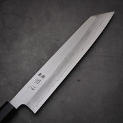 Close up view of the blade of Hatsukokoro Nakagawa ginsan kiritsuke gyuto knife. Image shows front side of the blade