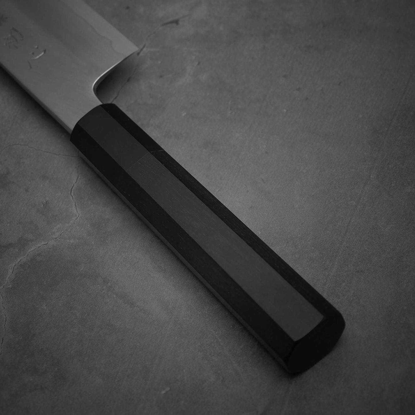 Close up view of the handle of Hatsukokoro Nakagawa ginsan kiritsuke gyuto knife