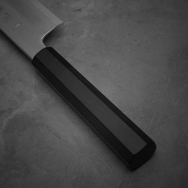 Close up view of the handle of Hatsukokoro Nakagawa ginsan kiritsuke gyuto knife