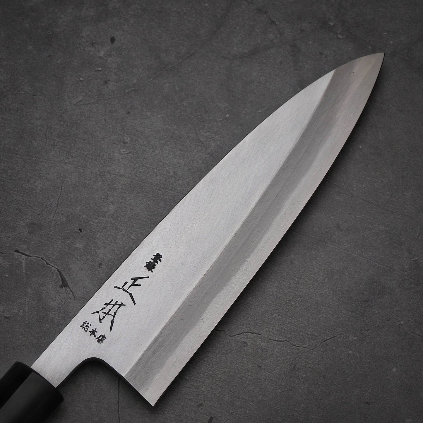 Close up view of the blade of Masamoto KS shirogami#2 ai-deba knife