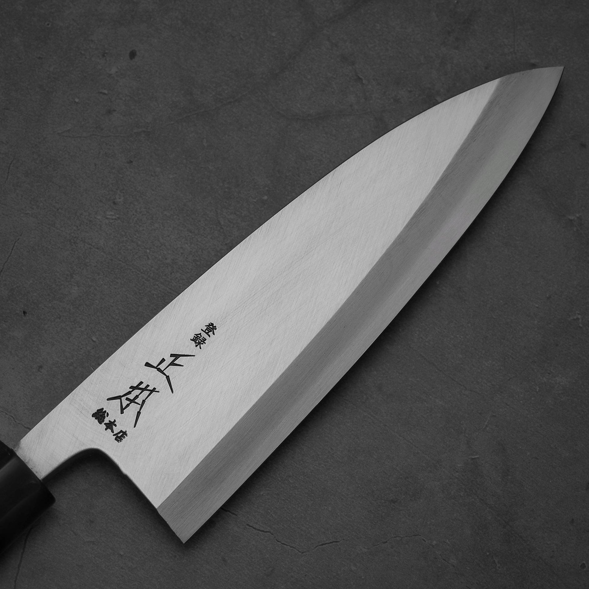 Close up view of the blade of Masamoto KS shirogami#2 deba knife