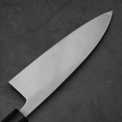 Close up view of the blade of Masamoto KS shirogami#2 deba knife. Image shows the back side