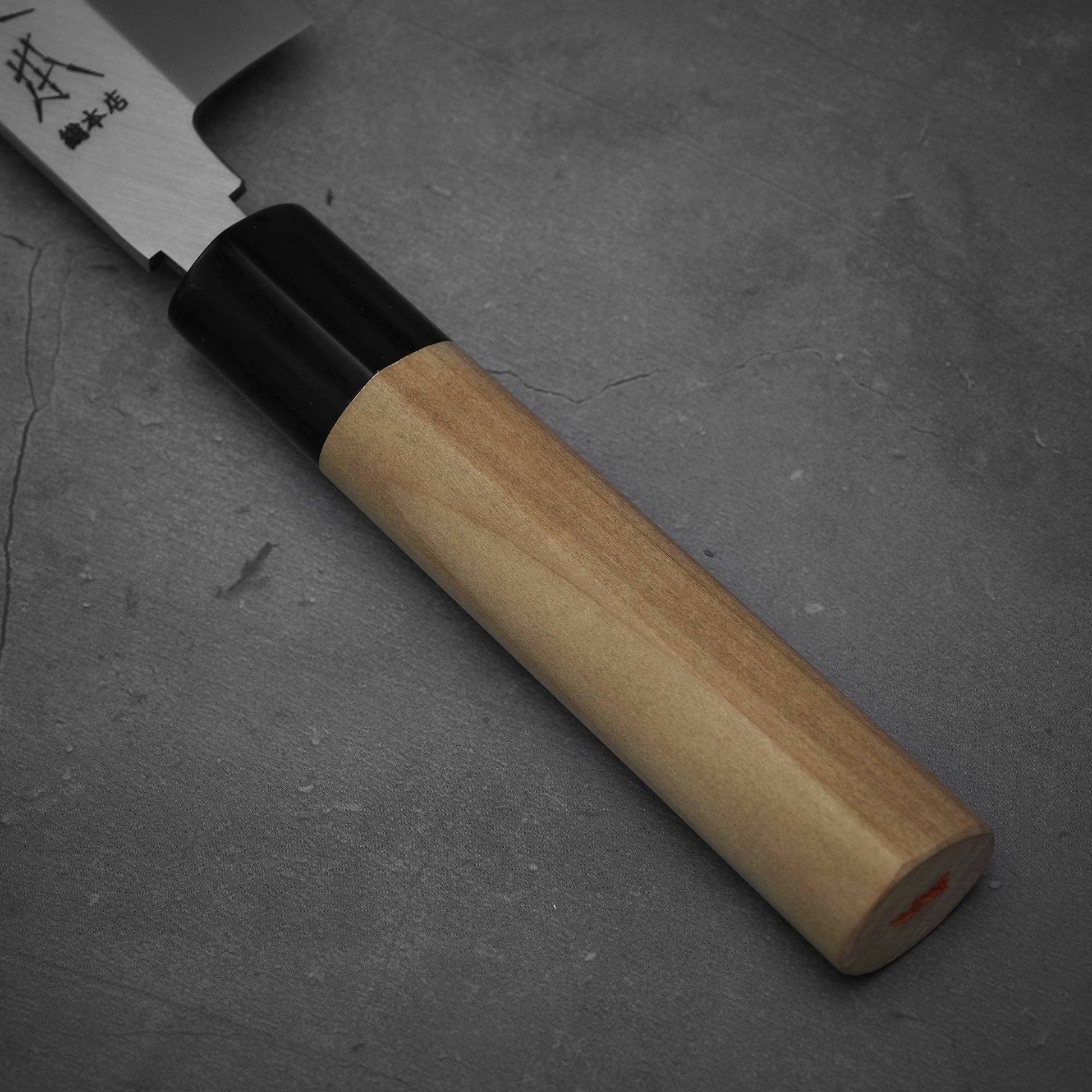 Close up view of the handle of Masamoto KS shirogami#2 kamagata usuba knife