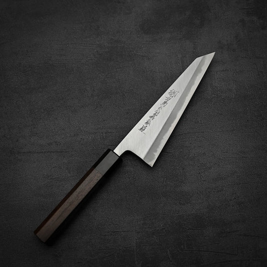 A top down view of Yoshikazu Tanaka shirogami#1 double bevel honesuki knife