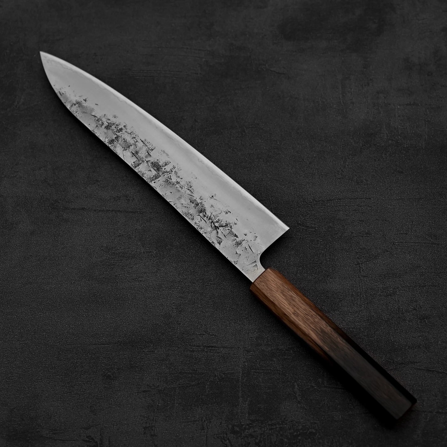 Top down view of Tsunehisa nashiji SLD gyuto knife in diagonal position