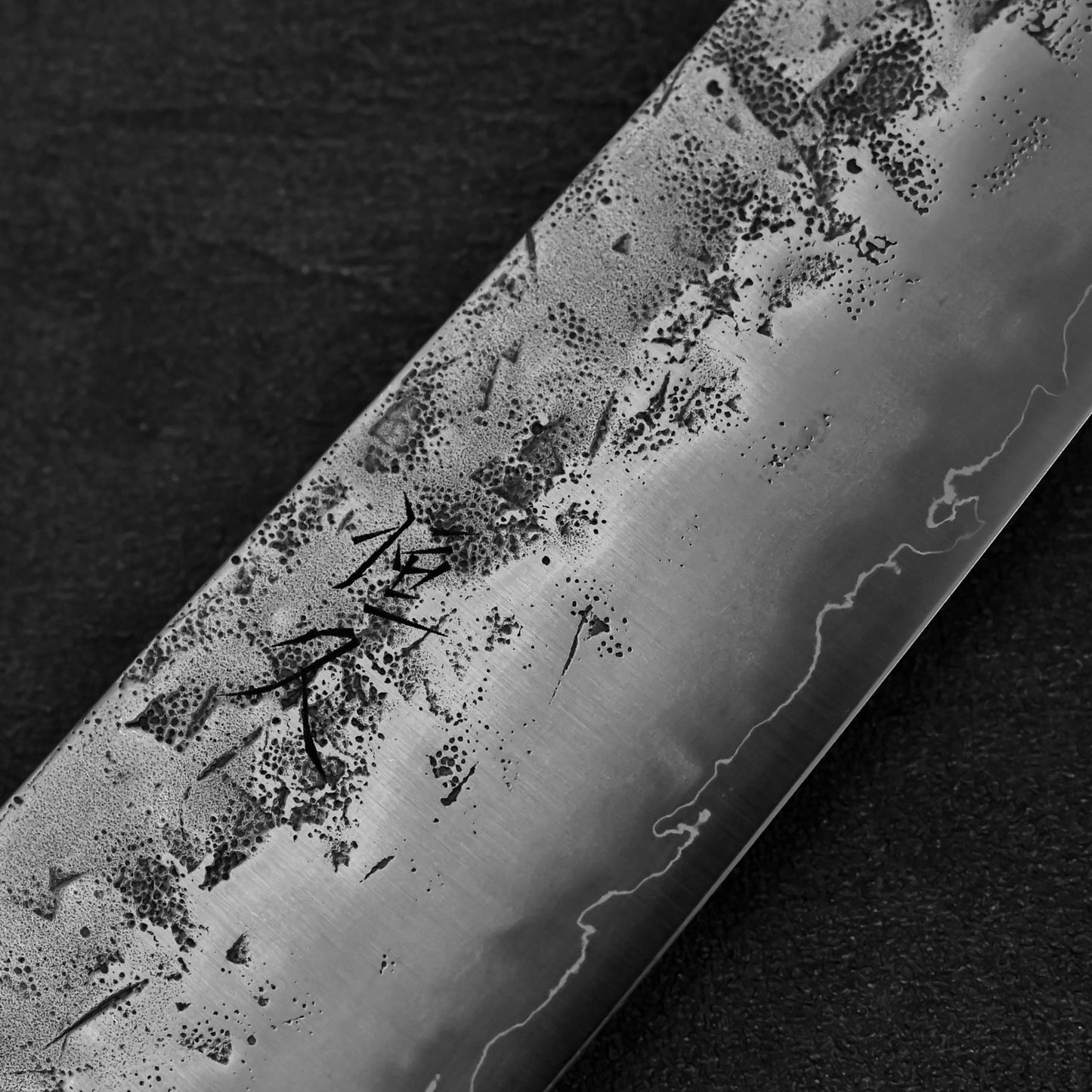 Close up of the kanji of Tsunehisa nashiji SLD gyuto knife