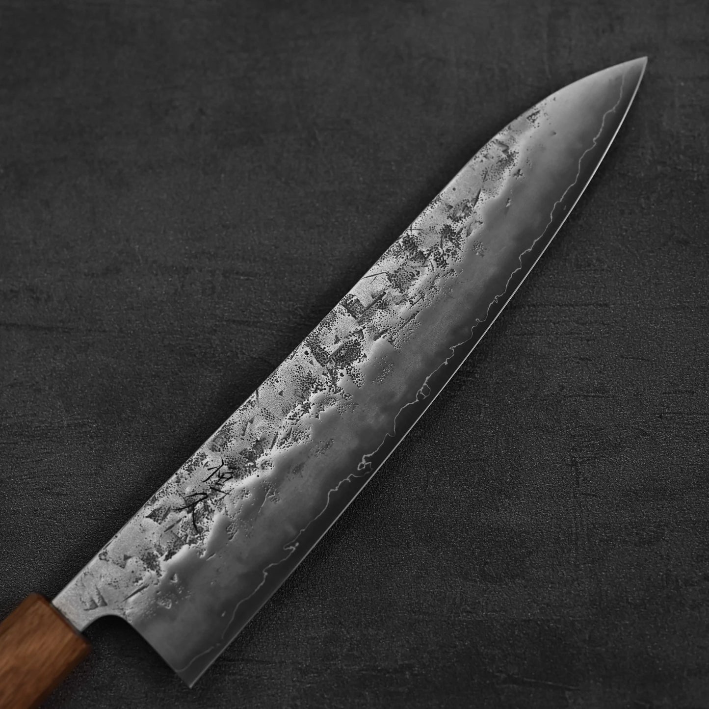 Close up view of the blade of Tsunehisa nashiji SLD gyuto knife