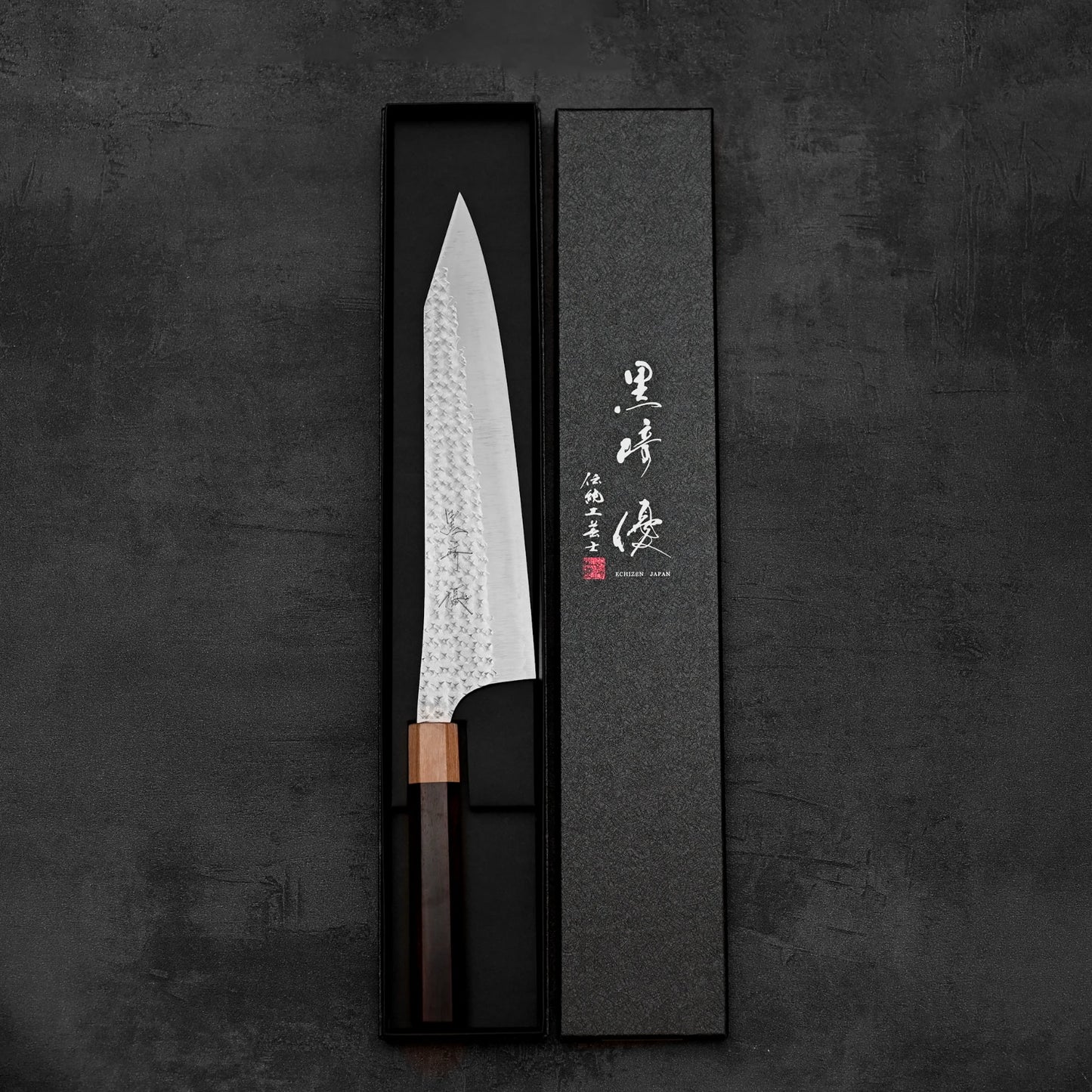 Top down view of Yu Kurosaki Senko SG2 gyuto knife in vertical position