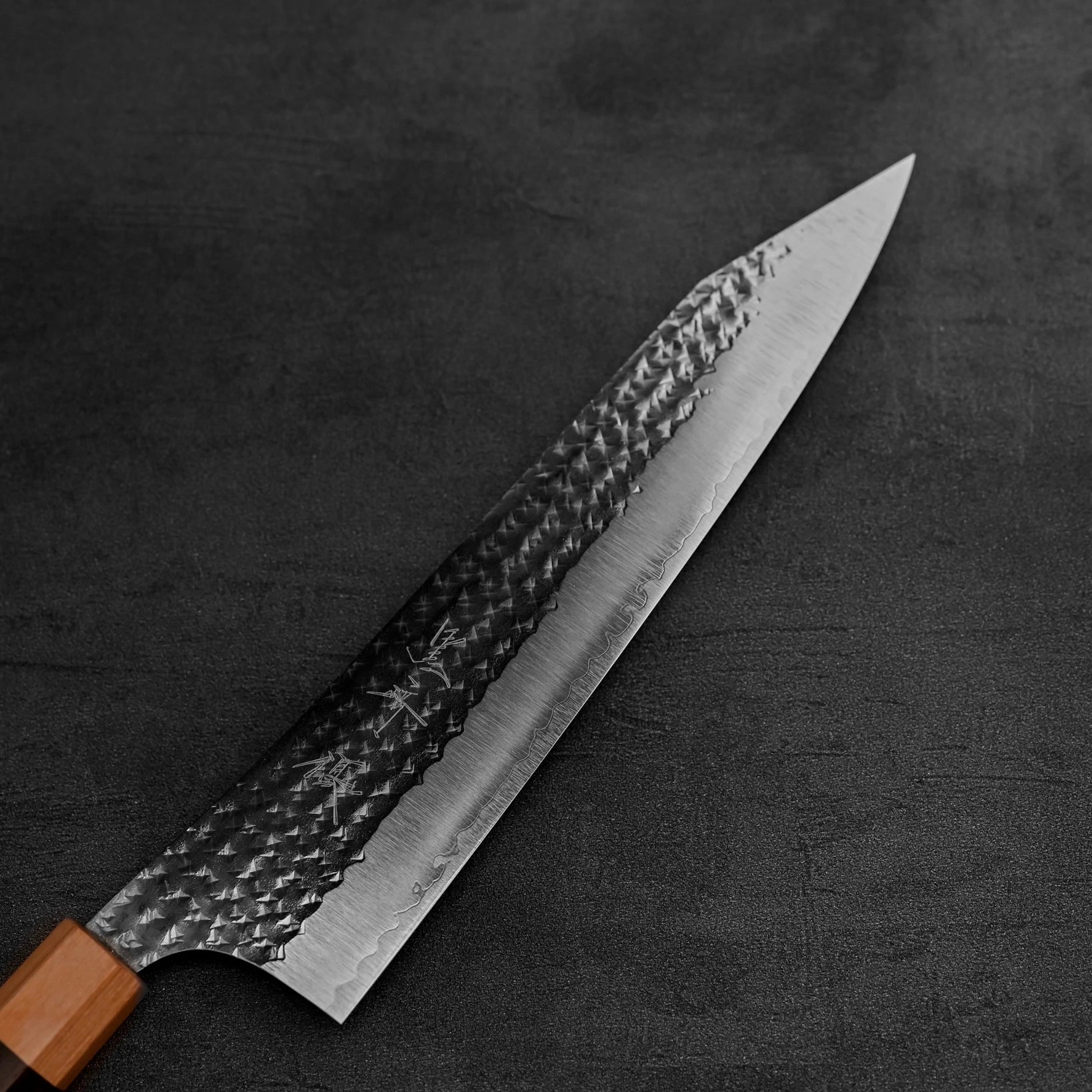 Close up view of the blade of Yu Kurosaki Senko SG2 gyuto knife