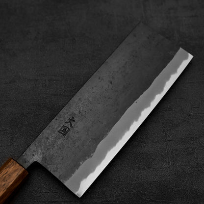 Close up view of the blade of Hinokuni kurouchi shirogami#1 chuka bocho knife