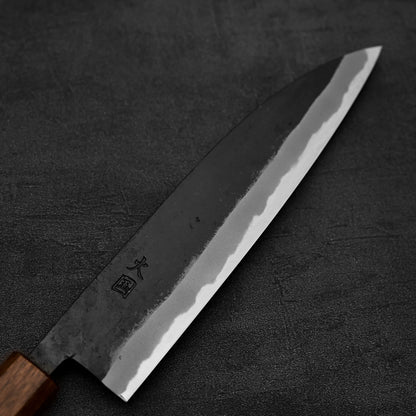 Close up view of the blade of Hinokuni kurouchi shirogami#1 gyuto knife