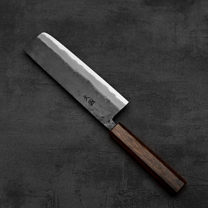 Top down view of Hinokuni kurouchi shirogami#1 nakiri knife in diagonal position