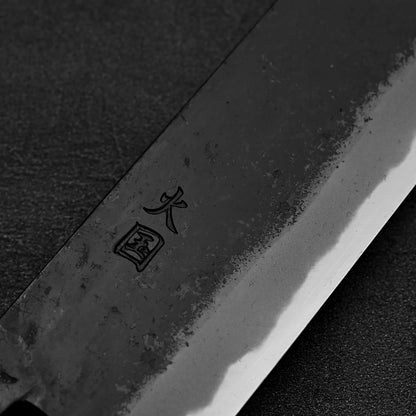 Close up of the kanji of Hinokuni kurouchi shirogami#1 nakiri knife