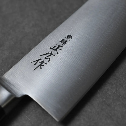 Macro detail of the maker's kanji on the blade of the Masahiro multipurpose knife