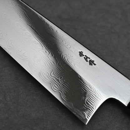 Close-up shot of the maker's mark of 210mm Nakagawa SPG STRIX damascus gyuto knife