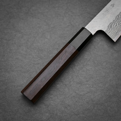 Close-up view of the handle of 210mm Nigara tsuchime damacsus VG10 gyuto knife