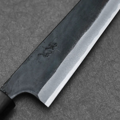 Detailed shot of the Ohishi blue#1 kitchen knife showing the maker's mark