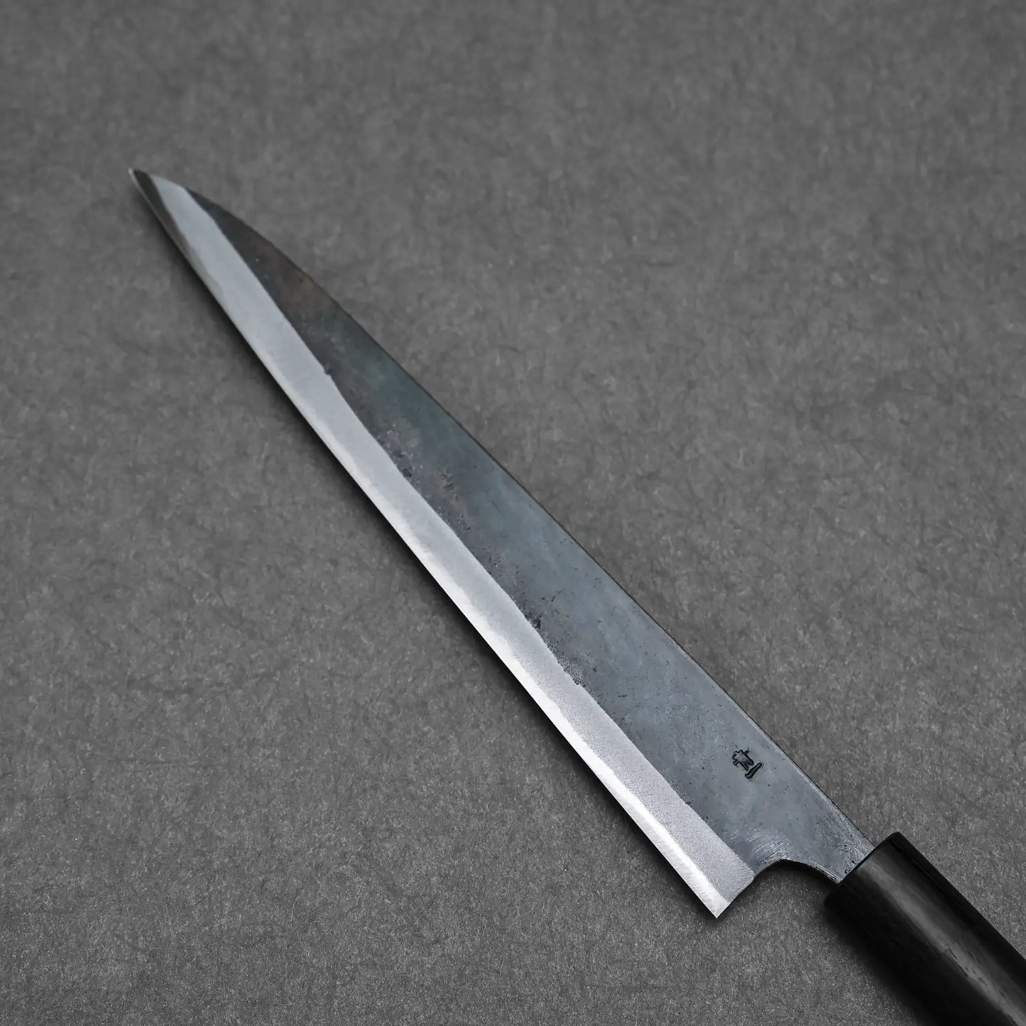 Close-up view of the back side of the Ohishi blue#1 suji knife