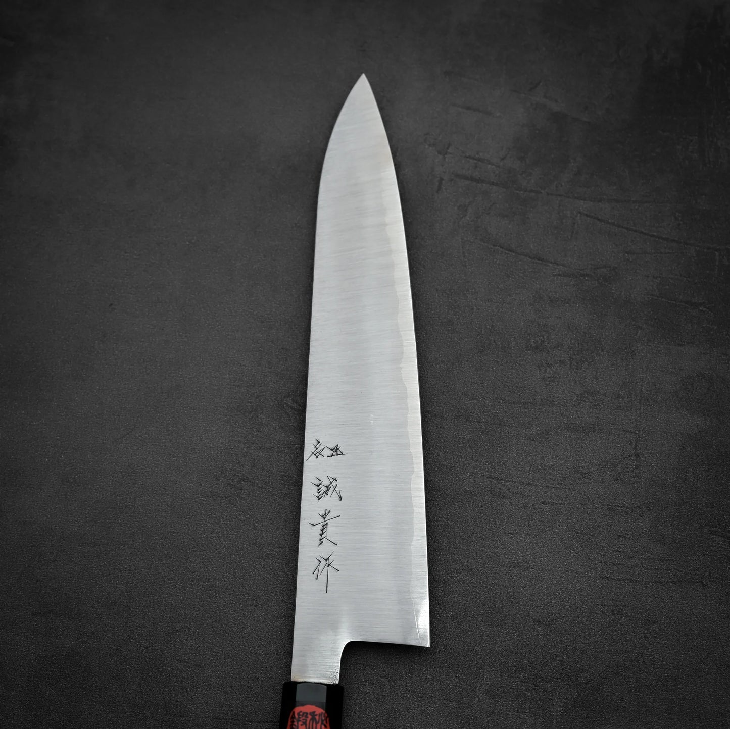 Close up view of the front side of Shigeki Tanaka ginsan gyuto knife