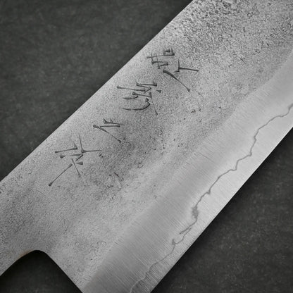 Close-up view showing maker's mark on 240mm Shigeki Tanaka nashiji ginsan gyuto knife