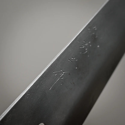 Close-up view of the spine of 240mm Shigeki Tanaka nashiji ginsan gyuto knife