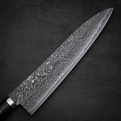 Close up view of the front side of 240mm Shigeki Tanaka R2 damascus ironwood gyuto knife