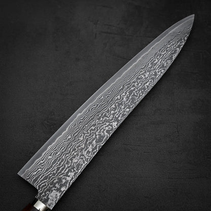 Close up shot of the back side of 270mm Shigeki Tanaka R2 damascus ironwood gyuto knife