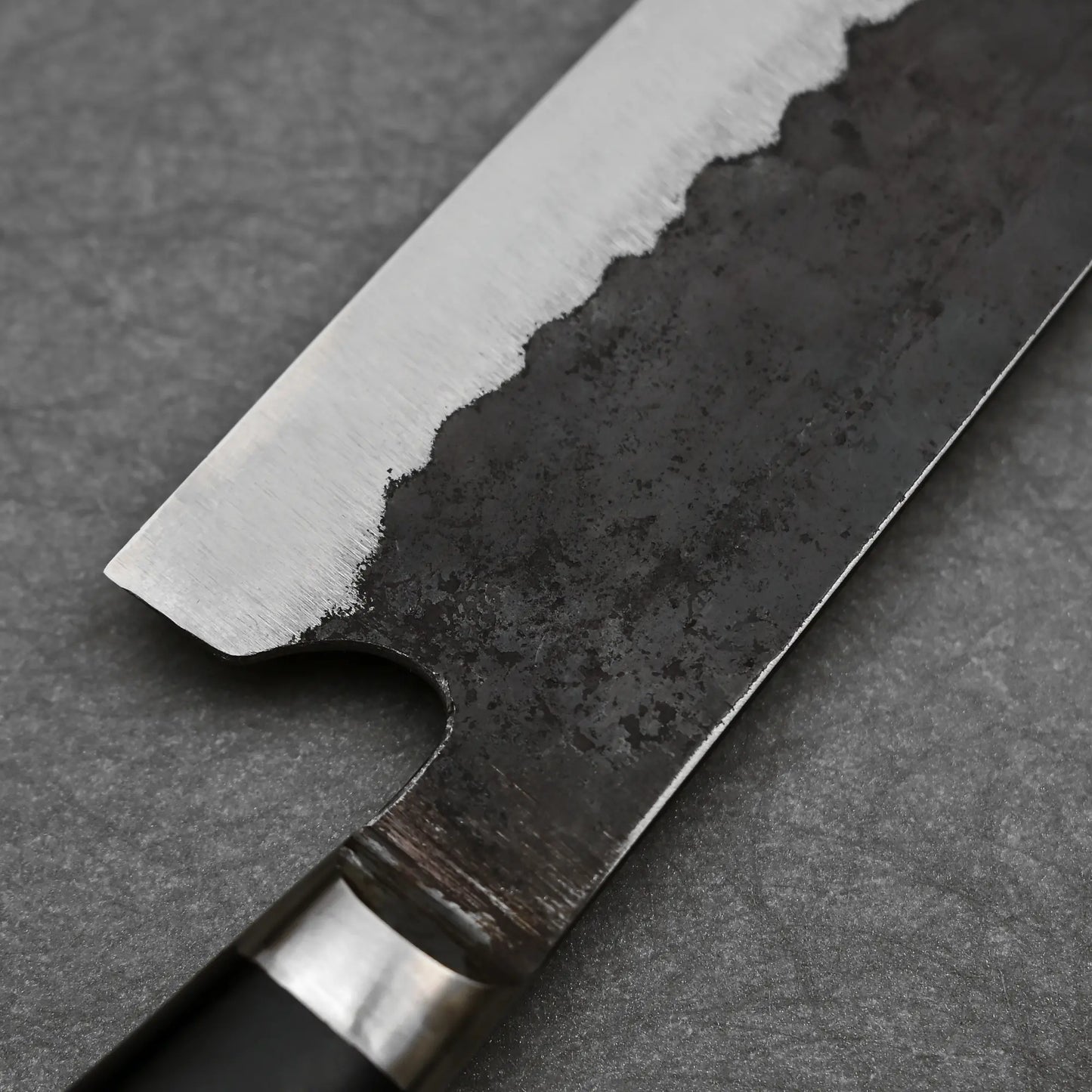 Close-up shot of finger rest of Teruyasu Fujiwara 240mm Denka gyuto knife