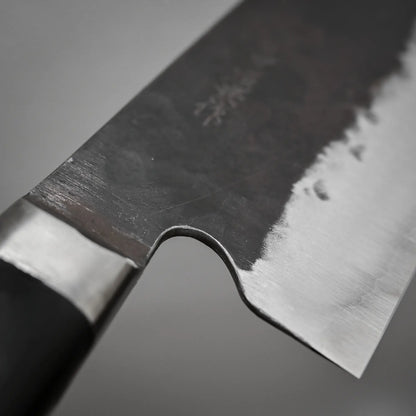 Close-up view of the choil of 165mm Teruyasu Fujiwara Denka nakiri knife