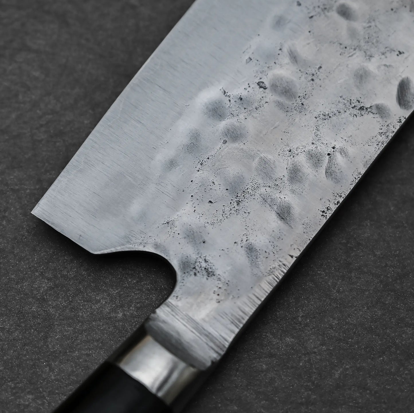 Close-up shot of the tsuchime finish on 165mm Teruyasu Fujiwara knife Maboroshi shirogami#1 nakiri