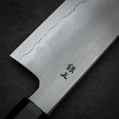 Close up shot of the back side of Tetsujin kasumi ginsan gyuto knife