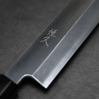 Close-up shot of the branding of Tsunehisa knife ginsan 300mm kiritsuke yanagiba