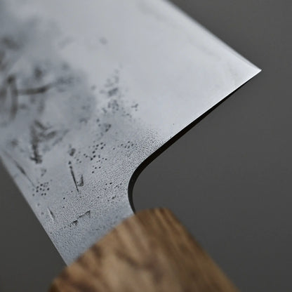 Close-up shot of the choil finish on 210mm Tsunehisa knife nashiji SLD kiritsuke gyuto