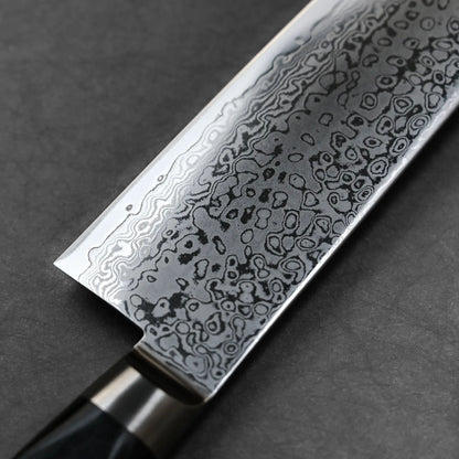 Close-up shot of Tsunehisa knife damascus VG10 210mm kiritsuke gyuto left side view