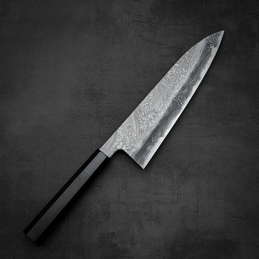 Top down view of Yoshihide Masuda shirogami#2 damascus tall gyuto knife