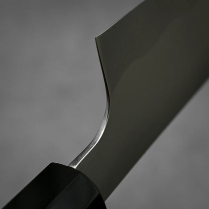 Close-up shot of the choil of 180mm Yoshihiko Akitomo knife aogami#2 honyaki santoku