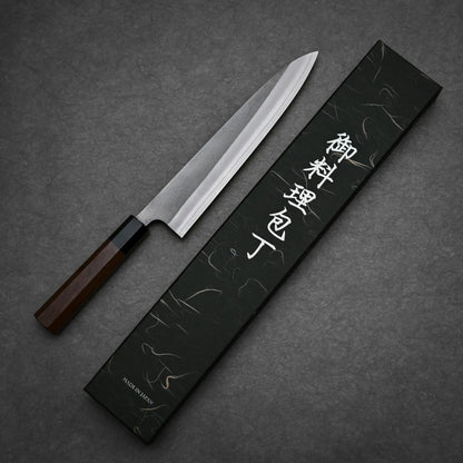 240mm Hatsukokoro x Yoshikane nashiji SKD gyuto knife showing full profile view with original box