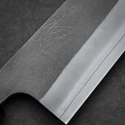 Close-up view of the branding of 240mm Hatsukokoro x Yoshikane nashiji SKD gyuto knife