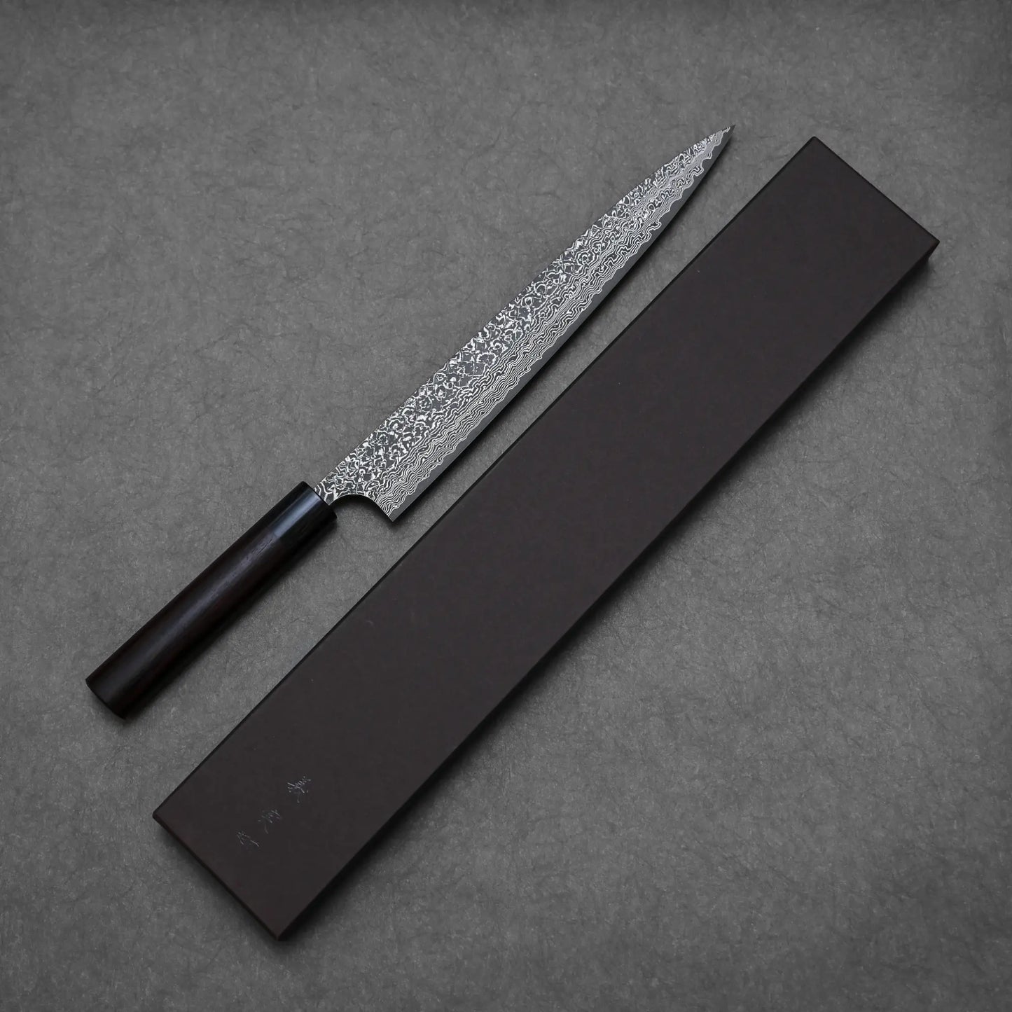 270mm Yoshimi Kato knife damascus VG10 sujihiki exhibiting full blade contour with box