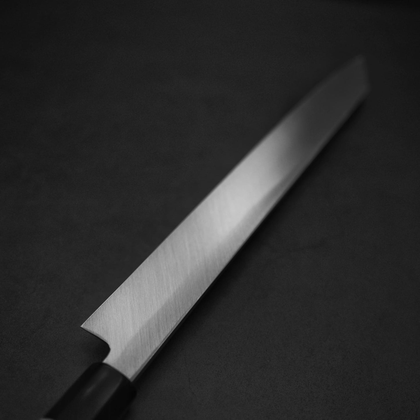 Angled view of the back side of Yoshihiro josaku shirogami #2 kiritsuke yanagiba 300mm